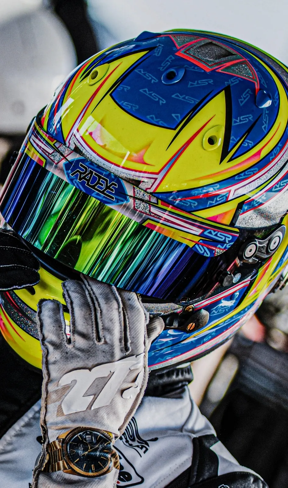 Nico holding his helmet